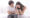 upset man comforting his depressed wife with negative pregnancy test